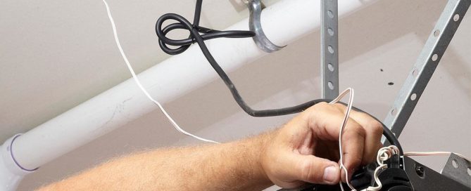 How to diagnose drained battery on your garage door opener system and how to replace it