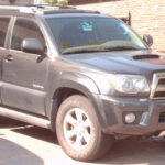 Gray Toyota 4Runner SUV with side steps