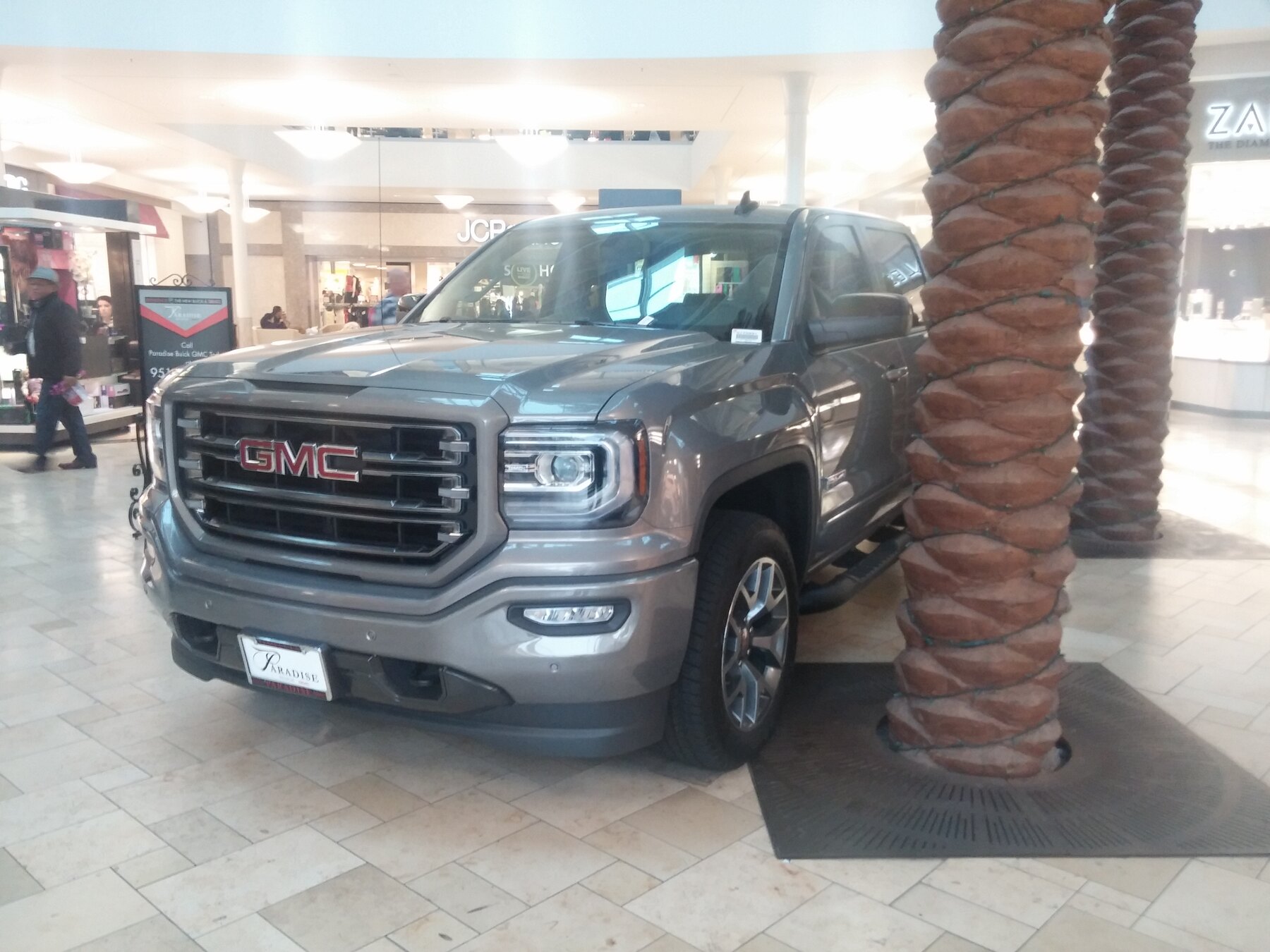 GMC Sierra pickup used as a running-board fitment reference