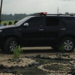 Black SUV shown in side profile