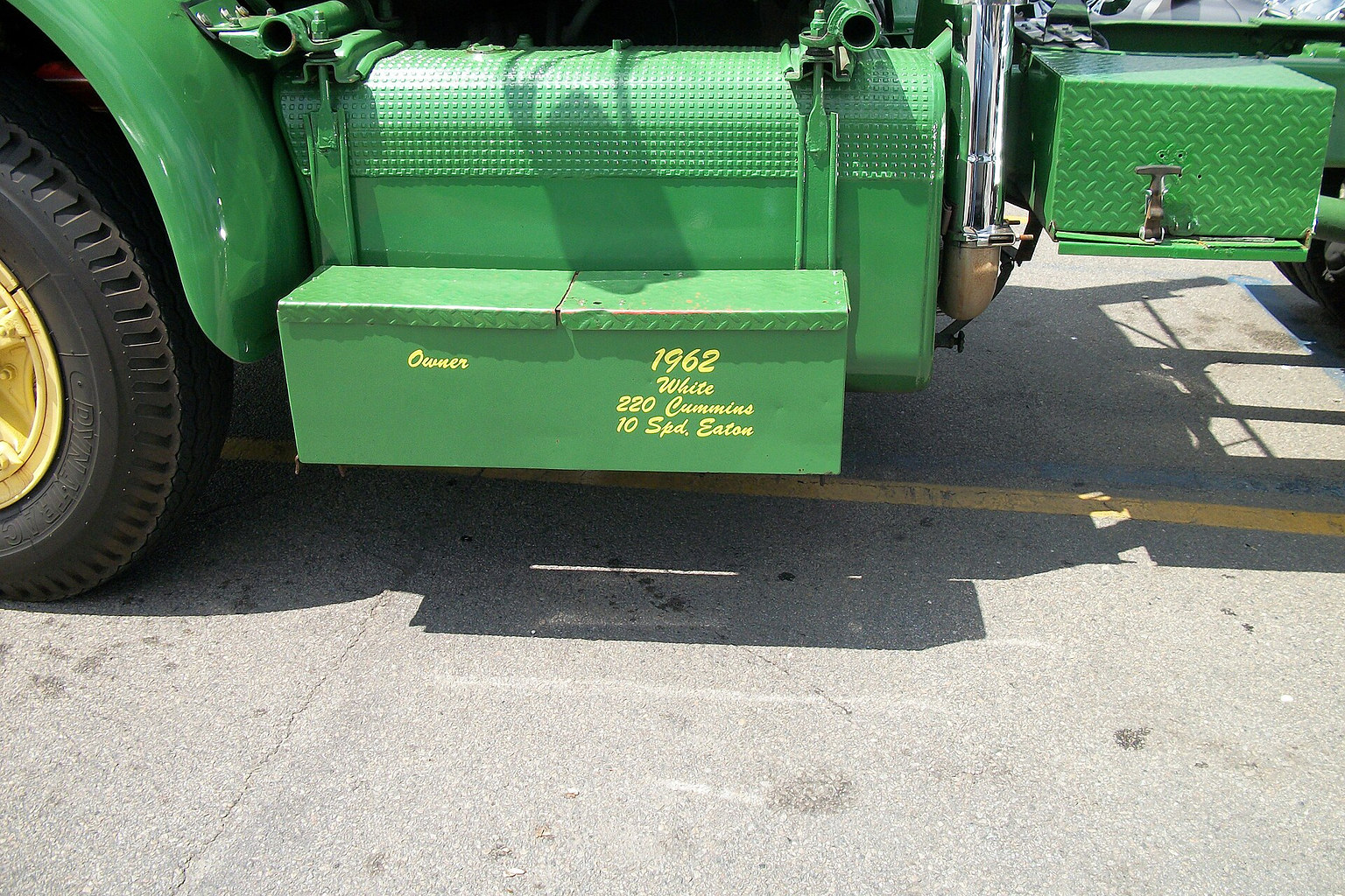 Close view of a vintage truck step and side compartment